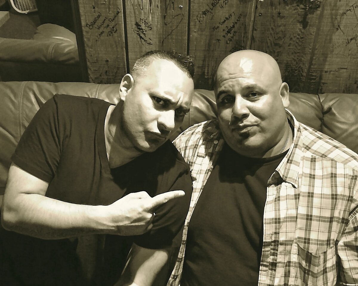Carlos with Russell Peters